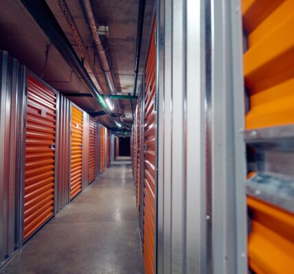 Closed modern storage boxes in warehouse